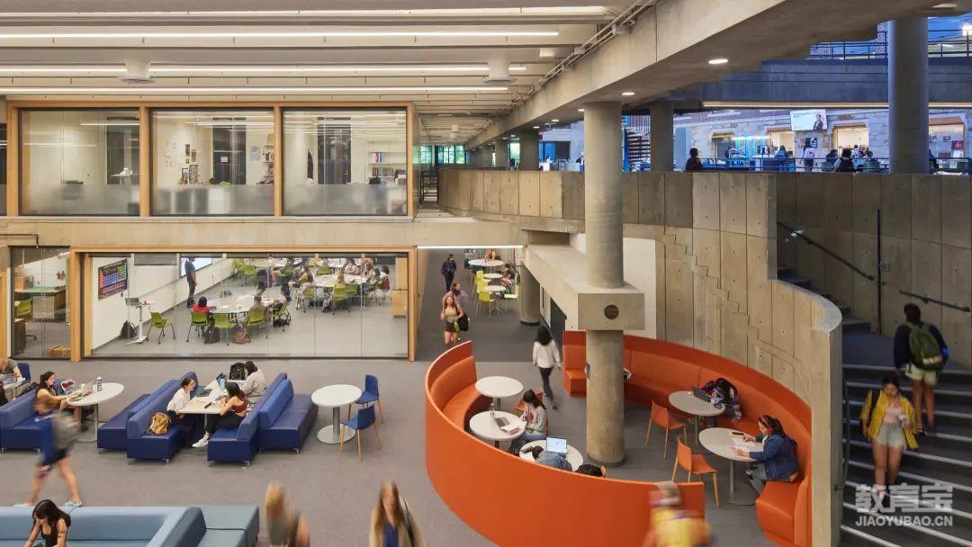 Overhead view of the Data Lounge and part of the Leaky Beaker area as students mill about.